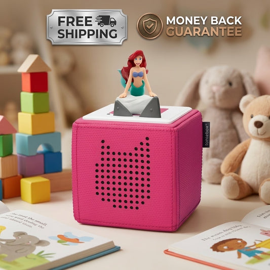 A pink children's toy box with a cat face cutout on the front, topped with a small mermaid figurine. The scene is styled in a child's room with toy blocks, plush toys, and open books, with 'FREE SHIPPING' and 'MONEY BACK GUARANTEE' badges at the top.