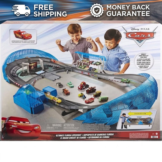 Disney Pixar Cars Ultimate Florida Speedway toy set in its retail packaging, featuring a blue and gray racetrack with multiple toy race cars and a bridge section.